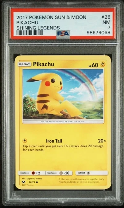 A 2017 Pikachu card graded PSA 7 in its protective slab